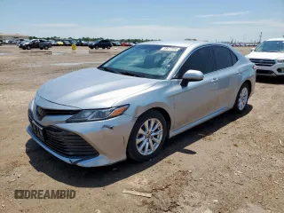 2018 Toyota Camry LE с VIN 4T1B11HK7JU002352, выставлен на аукционе Copart как лот 58672995 с пробегом 166 760 миль миль и Чистый • Clean title. История ставок и продаж доступна на DreamBid. Изображение 1.