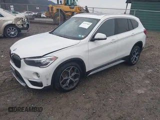 2018 BMW X1 xDrive28i with VIN WBXHT3C33J5L34824, listed as a IAAI auction lot 41977462 with 84,131 mi miles and . Bid and sale history available at DreamBid. Image 2.
