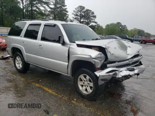 2004 Chevrolet Tahoe LT with VIN 1GNEC13Z34J124204, listed as a Copart auction lot 50416135 with 310,955 mi miles and Salvage title. Bid and sale history available at DreamBid. Image 4.