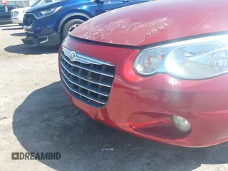 2005 Chrysler Sebring Touring z VIN 1C3EL55R55N704615, wystawiony jako IAAI lot #42469660 z przebiegiem 133 744 mil mil oraz . Historia ofert i sprzedaży dostępna na DreamBid. Obrazek 12.