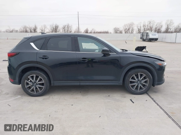 2017 Mazda CX-5 Grand Touring with VIN JM3KFADL9H0110985, listed as a IAAI auction lot 41435143 with 88,208 mi miles. Bid and sale history available at carsss.com. Image 13.