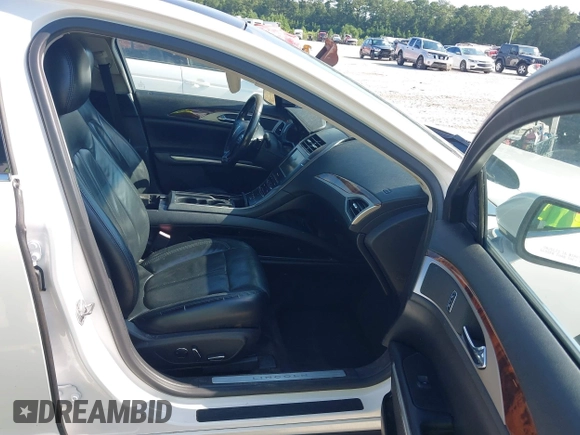 2015 Lincoln MKZ with VIN 3LN6L2G91FR606753, listed as a IAAI auction lot 42693490 with Not provided miles and . Bid and sale history available at DreamBid. Image 5.