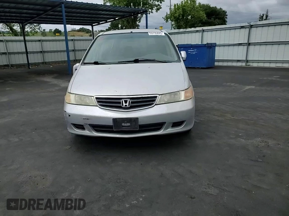 2002 Honda Odyssey EX-L with VIN 2HKRL18902H506828, listed as a Copart auction lot 53735625 with 214,446 mi miles and Salvage title. Bid and sale history available at DreamBid. Image 11.