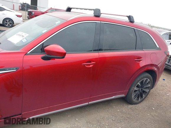 2024 Mazda CX-90 S z VIN JM3KK1HC2R1133087, wystawiony jako IAAI lot #41955750 z przebiegiem 24 217 mil mil oraz . Historia ofert i sprzedaży dostępna na DreamBid. Obrazek 14.