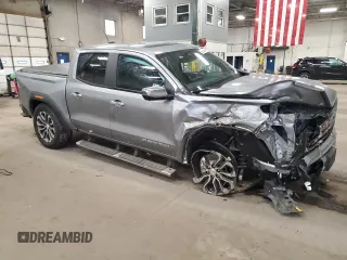 2023 GMC Canyon 4WD Denali with VIN 1GTP6FEK6P1232066, listed as a Copart auction lot 85235884 with 20,165 mi miles and Salvage Title. Bid and sale history available at carsss.com. Image 4.
