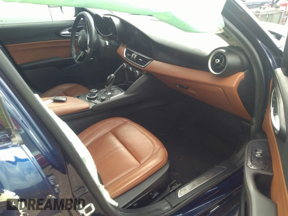 2017 Alfa Romeo Giulia with VIN ZARFAEBN6H7542743, listed as a IAAI auction lot 35600001 with 73,631 mi miles. Bid and sale history available at carsss.com. Image 5.
