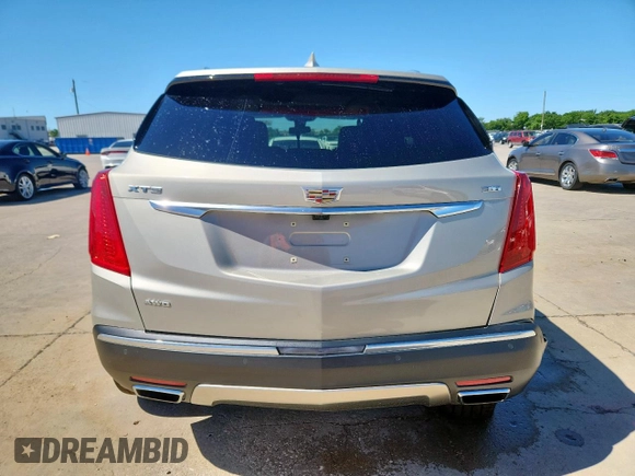 2017 Cadillac XT5 Platinum AWD z VIN 1GYKNFRS0HZ111747, wystawiony jako Copart lot #57666415 z przebiegiem 72 632 mil mil oraz Szkoda całkowita • Salvage title. Historia ofert i sprzedaży dostępna na DreamBid. Obrazek 6.