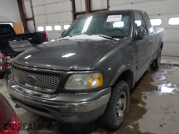 2003 Ford F-150 XL with VIN 1FTRX18W63NB69173, listed as a IAAI auction lot 41618645 with 219,506 mi miles. Bid and sale history available at carsss.com. Image 6.