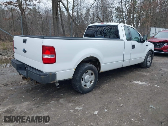 2007 Ford F-150 XL with VIN 1FTRF12257NA47662, listed as a IAAI auction lot 42003991 with 154,502 mi miles. Bid and sale history available at carsss.com. Image 4.