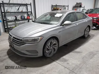 2020 Volkswagen Jetta SEL z VIN 3VWE57BU0LM087350, wystawiony jako IAAI lot #41581637 z przebiegiem 60 528 mil mil oraz . Historia ofert i sprzedaży dostępna na DreamBid. Obrazek 17.