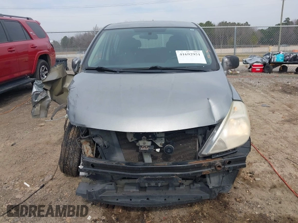 2009 Nissan Versa S with VIN 3N1BC13E59L407294, listed as a IAAI auction lot 41692951 with 250,029 mi miles and . Bid and sale history available at DreamBid. Image 12.
