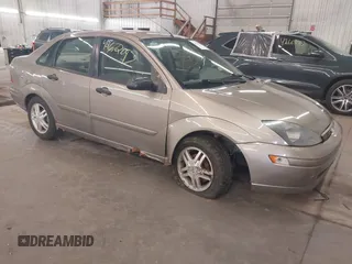 2004 Ford Focus SE z VIN 1FAFP34Z24W146831, wystawiony jako IAAI lot #42672097 z przebiegiem 242 110 mil mil oraz . Historia ofert i sprzedaży dostępna na DreamBid. Obrazek 1.
