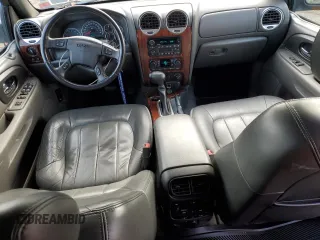 2004 GMC Envoy SLT z VIN 1GKDT13S042406662, wystawiony jako Copart lot #50523855 z przebiegiem 62 122 mil mil oraz Czysty tytuł • Clean title. Historia ofert i sprzedaży dostępna na DreamBid. Obrazek 8.