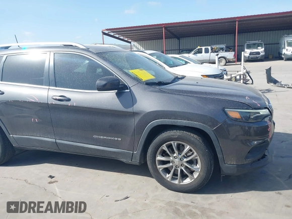 2019 Jeep Cherokee Latitude Plus with VIN 1C4PJLLB0KD382309, listed as a IAAI auction lot 41812968 with 144,368 mi miles. Bid and sale history available at carsss.com. Image 14.