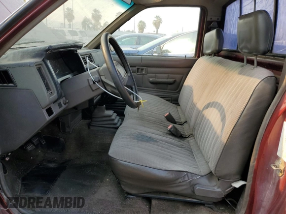 1989 Nissan Hardbody z VIN 1N6ND11S0KC342434, wystawiony jako Copart lot #71089274 z przebiegiem 300 076 mil mil oraz Szkody całkowita. Historia ofert i sprzedaży dostępna na DreamBid. Obrazek 7.