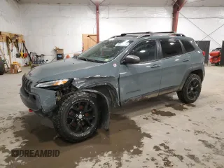 2015 Jeep Cherokee Trailhawk with VIN 1C4PJMBS1FW641388, listed as a Copart auction lot 49126785 with 109,828 mi miles and Salvage Title. Bid and sale history available at carsss.com. Image 1.