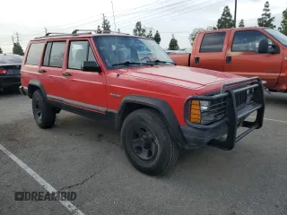 1996 Jeep Cherokee Sport with VIN 1J4FT68S8TL232241, listed as a Copart auction lot 82170904 with 287,125 mi miles and Salvage Title. Bid and sale history available at carsss.com. Image 4.