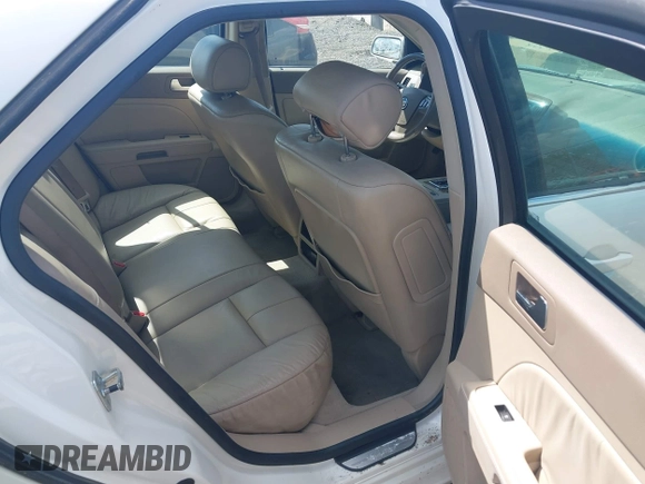 2005 Cadillac STS z VIN 1G6DW677750171537, wystawiony jako IAAI lot #42270330 z przebiegiem 126 889 mil mil oraz . Historia ofert i sprzedaży dostępna na DreamBid. Obrazek 8.