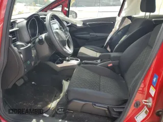 2016 Honda Fit LX with VIN JHMGK5H54GX010407, listed as a Copart auction lot 60127785 with 70,089 mi miles and Salvage title. Bid and sale history available at DreamBid. Image 7.