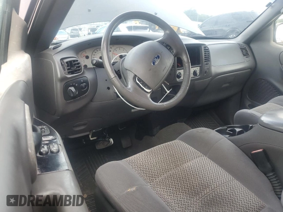 2003 Ford F-150 XL with VIN 1FTRX07243KD13281, listed as a Copart auction lot 59639315 with 257,545 mi miles and Clean title. Bid and sale history available at DreamBid. Image 8.