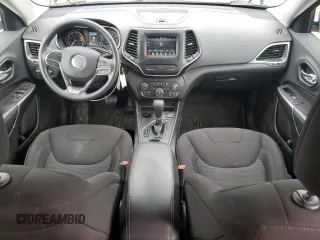 2019 Jeep Cherokee Latitude with VIN 1C4PJLCB9KD412004, listed as a Copart auction lot 61642015 with 121,336 mi miles and Salvage title. Bid and sale history available at DreamBid. Image 8.