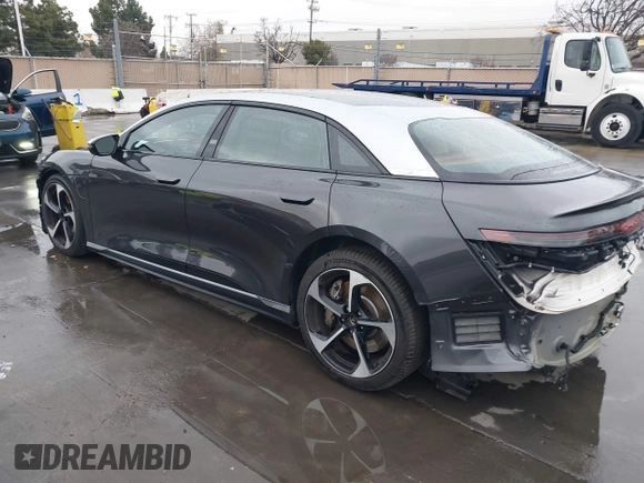 2023 Lucid Air Grand Touring z VIN 50EA1GBA3PA001806, wystawiony jako IAAI lot #41713303 z przebiegiem 6367 mil mil oraz . Historia ofert i sprzedaży dostępna na DreamBid. Obrazek 3.