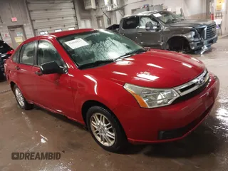 2010 Ford Focus SE with VIN 1FAHP3FNXAW263765, listed as a IAAI auction lot 42058813 with 219,009 mi miles. Bid and sale history available at carsss.com. Image 1.
