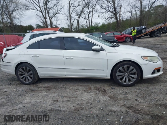 2010 Volkswagen CC Sport with VIN WVWML7AN5AE505256, listed as a IAAI auction lot 41870530 with 173,336 mi miles. Bid and sale history available at carsss.com. Image 14.