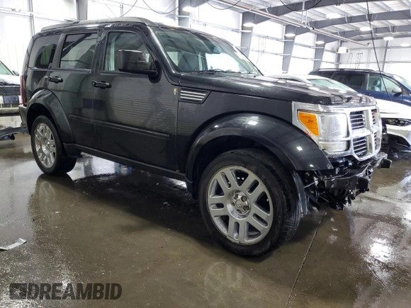 2008 Dodge Nitro SLT z VIN 1D8GU58KX8W206104, wystawiony jako Copart lot #71740974 z przebiegiem 236 981 mil mil oraz Szkoda całkowita • Salvage title. Historia ofert i sprzedaży dostępna na DreamBid. Obrazek 4.
