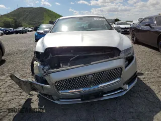 2017 Lincoln Continental Premiere with VIN 1LN6L9PK1H5627474, listed as a Copart auction lot 51541255 with 71,566 mi miles and Salvage Title. Bid and sale history available at DreamBid. Image 5.