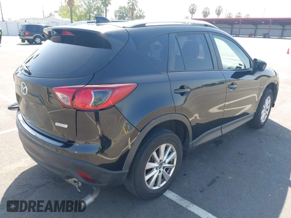 2014 Mazda CX-5 Sport z VIN JM3KE2BE8E0371775, wystawiony jako IAAI lot #42111417 z przebiegiem 150 932 mil mil oraz . Historia ofert i sprzedaży dostępna na DreamBid. Obrazek 4.
