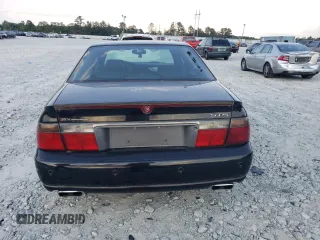 2001 Cadillac Seville Touring STS z VIN 1G6KY549X1U282930, wystawiony jako Copart lot #72750504 z przebiegiem Nie podano mil oraz Szkoda całkowita • Salvage title. Historia ofert i sprzedaży dostępna na DreamBid. Obrazek 6.