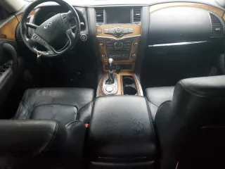 2012 Infiniti QX56 8-passenger with VIN JN8AZ2ND5C9715426, listed as a Copart auction lot 44951355 with 0 mi miles and Salvage Title. Bid and sale history available at carsss.com. Image 8.