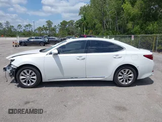 2013 Lexus ES 300h Hybrid with VIN JTHBW1GG0D2002520, listed as a IAAI auction lot 42049567 with 195,538 mi miles. Bid and sale history available at carsss.com. Image 15.