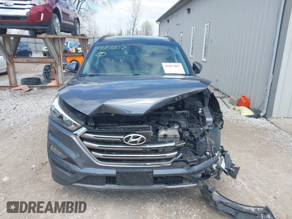 2016 Hyundai Tucson Eco with VIN KM8J3CA2XGU103017, listed as a IAAI auction lot 41897807 with 95,722 mi miles. Bid and sale history available at carsss.com. Image 12.