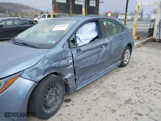 2020 Toyota Corolla LE with VIN JTDEPRAEXLJ001297, listed as a IAAI auction lot 41880882 with 76,407 mi miles. Bid and sale history available at carsss.com. Image 6.
