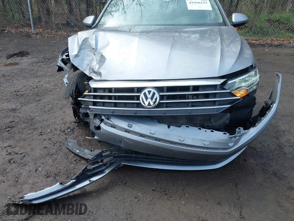 2021 Volkswagen Jetta S z VIN 3VWC57BUXMM048600, wystawiony jako IAAI lot #41956222 z przebiegiem 59 870 mil mil oraz . Historia ofert i sprzedaży dostępna na DreamBid. Obrazek 19.