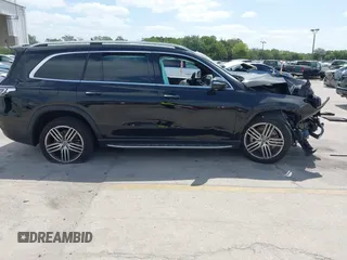 2021 Mercedes-Benz GLS 450 z VIN 4JGFF5KE5MA469689, wystawiony jako IAAI lot #42113396 z przebiegiem 23 930 mil mil oraz . Historia ofert i sprzedaży dostępna na DreamBid. Obrazek 14.