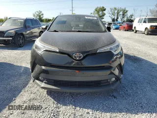 2019 Toyota C-HR XLE z VIN JTNKHMBX9K1016158, wystawiony jako Copart lot #54121995 z przebiegiem 119 716 mil mil oraz Szkoda całkowita • Salvage title. Historia ofert i sprzedaży dostępna na DreamBid. Obrazek 5.