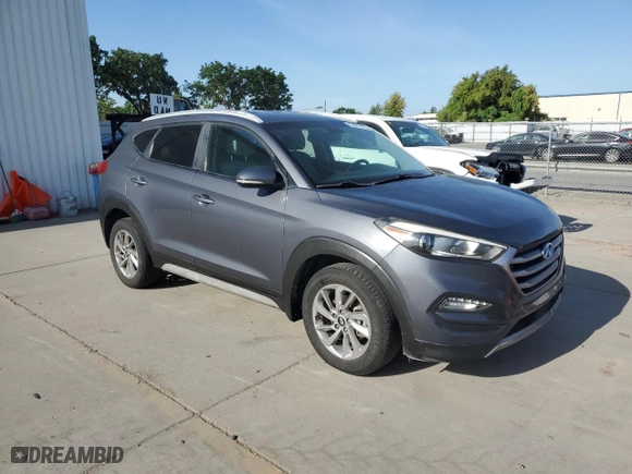 2017 Hyundai Tucson Value with VIN KM8J33A25HU401072, listed as a Copart auction lot 53973115 with 138,204 mi miles and Salvage Title. Bid and sale history available at carsss.com. Image 4.