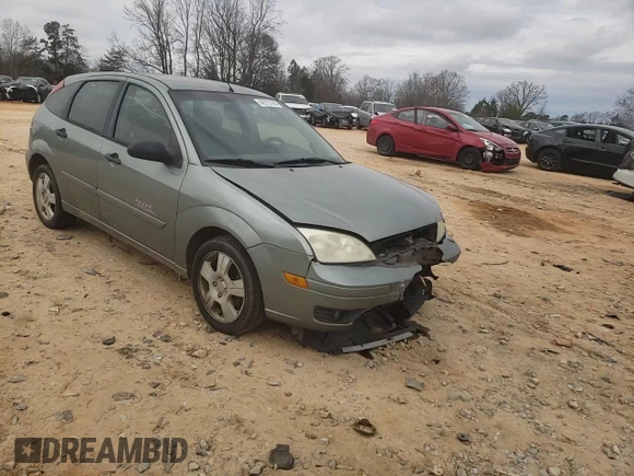 2006 Ford Focus S with VIN 1FAHP37N76W180039, listed as a Copart auction lot 58328565 with 220,696 mi miles and Salvage title. Bid and sale history available at DreamBid. Image 10.