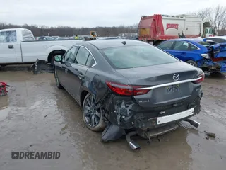 2020 Mazda 6 Grand Touring with VIN JM1GL1TYXL1524543, listed as a IAAI auction lot 41474337 with 52,160 mi miles and . Bid and sale history available at DreamBid. Image 3.