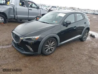 2016 Mazda CX-3 Grand Touring with VIN JM1DKBD7XG0125001, listed as a IAAI auction lot 41777712 with NaN miles. Bid and sale history available at carsss.com. Image 18.