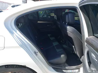 2013 BMW 5 Series 528i with VIN WBAXG5C56DD230121, listed as a IAAI auction lot 42019899 with 142,100 mi miles and . Bid and sale history available at carsss.com. Image 8.
