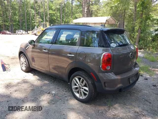 2012 MINI Countryman S with VIN WMWZC5C57CWL62344, listed as a IAAI auction lot 42576587 with 191,597 mi miles and . Bid and sale history available at DreamBid. Image 3.