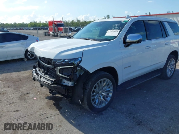 2023 Chevrolet Tahoe Premier with VIN 1GNSKSKD0PR453465, listed as a IAAI auction lot 42512099 with 23,252 mi miles and . Bid and sale history available at DreamBid. Image 6.
