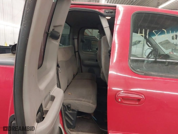 2000 Ford F-150 XL with VIN 1FTRX18L0YNA84231, listed as a IAAI auction lot 41824453 with 223,642 mi miles. Bid and sale history available at carsss.com. Image 8.