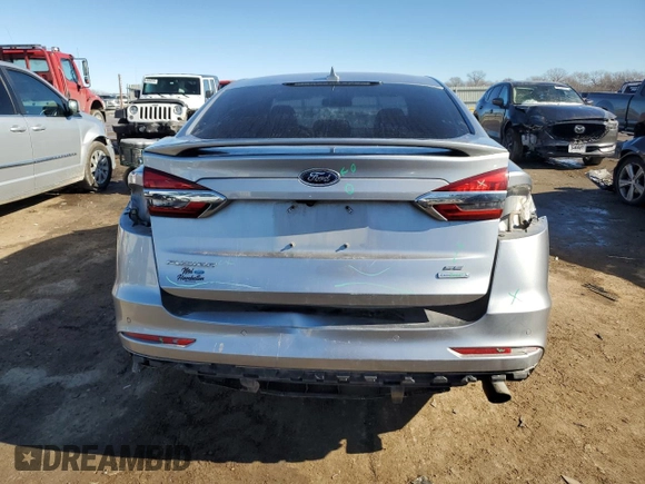 2020 Ford Fusion SE with VIN 3FA6P0HD8LR128879, listed as a Copart auction lot 89090425 with 129,784 mi miles and Salvage Title. Bid and sale history available at carsss.com. Image 6.