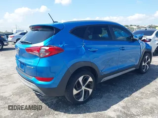 2017 Hyundai Tucson Value z VIN KM8J33A23HU540472, wystawiony jako IAAI lot #41935056 z przebiegiem 58 937 mil mil oraz . Historia ofert i sprzedaży dostępna na DreamBid. Obrazek 4.
