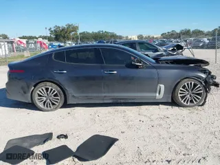 2019 Kia Stinger with VIN KNAE15LA7K6066305, listed as a IAAI auction lot 41238678 with 76,206 mi miles. Bid and sale history available at carsss.com. Image 13.